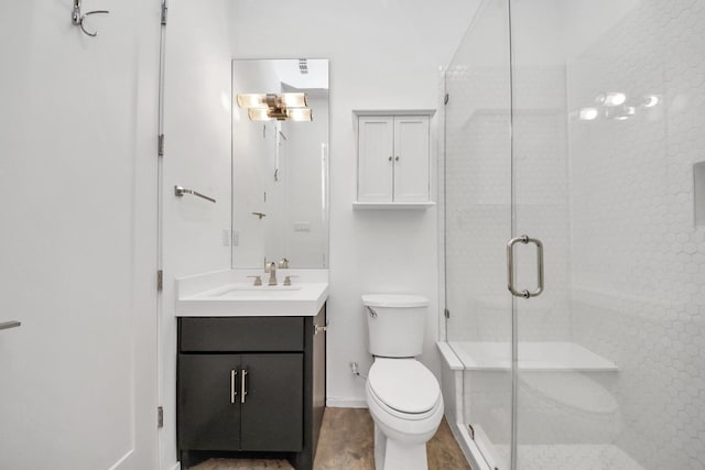 1512 Malone St, Houston, TX 77007 - bathroom featuring toilet, a stall shower, vanity, and baseboards