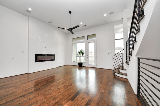 1512 Malone St, Houston, TX 77007 - unfurnished living room featuring stairway, ceiling fan, recessed lighting, a fireplace, and wood finished floors