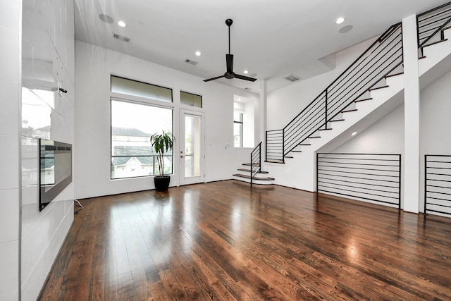 1512 Malone St, Houston, TX 77007 - foyer featuring a ceiling fan, visible vents, wood finished floors, and stairs