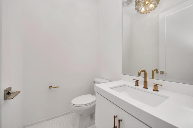 1512 Malone St, Houston, TX 77007 - half bath with tile patterned floors, an inviting chandelier, toilet, and vanity