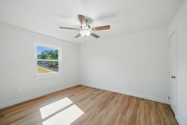 9711 Derrik Dr, Houston, TX 77080 - spare room featuring ceiling fan, baseboards, and light wood finished floors