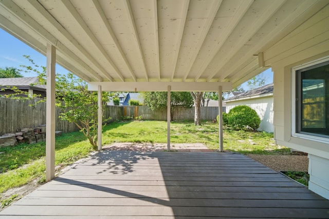 9711 Derrik Dr, Houston, TX 77080 - wooden terrace featuring a fenced backyard and a yard
