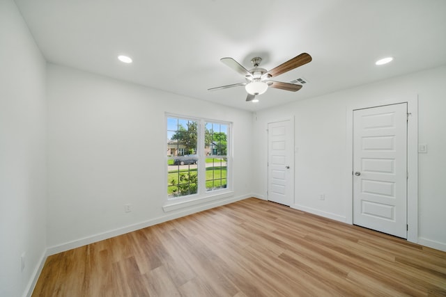 9711 Derrik Dr, Houston, TX 77080 - unfurnished bedroom featuring recessed lighting, visible vents, light wood finished floors, and baseboards