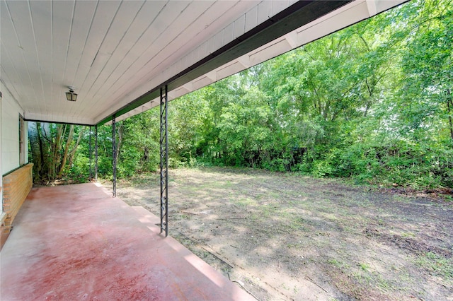 808 State Highway Loop 393, Goodrich, TX 77335 - view of yard with a patio and a forest view