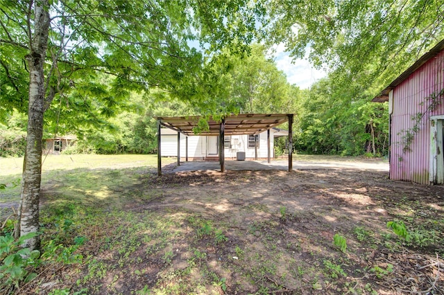 808 State Highway Loop 393, Goodrich, TX 77335 - view of yard with a detached carport