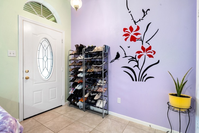 foyer with light tile patterned floors