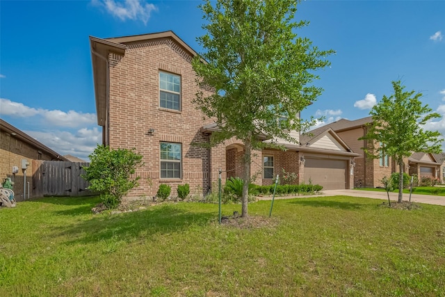 traditional home with brick siding, driveway, a front lawn, and a garage