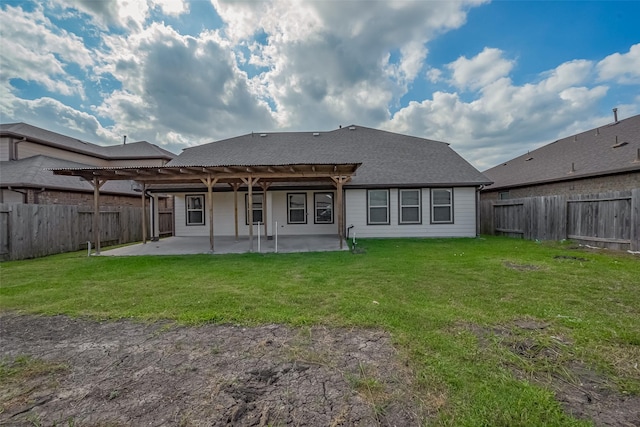rear view of property featuring a fenced backyard, a pergola, a yard, and a patio