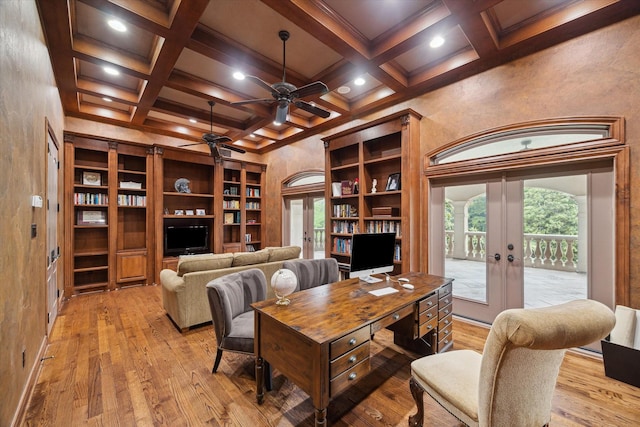 office space with ceiling fan, beamed ceiling, french doors, and light wood finished floors
