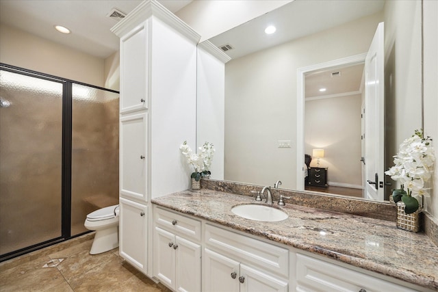 bathroom with visible vents, vanity, toilet, recessed lighting, and a stall shower