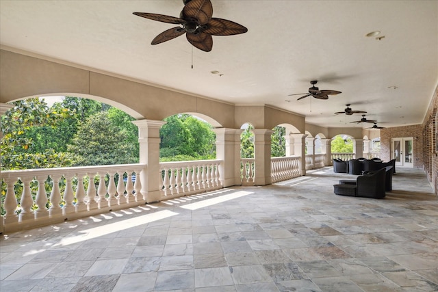 view of patio / terrace with ceiling fan and french doors