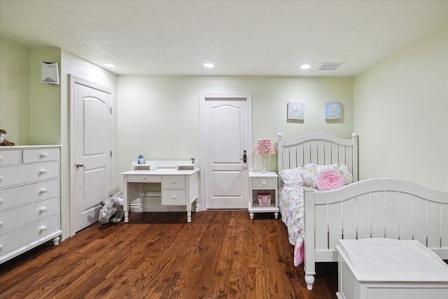bedroom featuring visible vents, recessed lighting, and dark wood finished floors