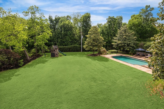 exterior space featuring a gazebo, a swimming pool, and a playground