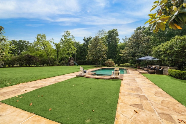 view of property's community with a patio, outdoor lounge area, a yard, and a swimming pool