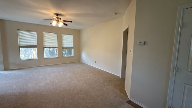 4923 Lake Gladewater Ct, Richmond, TX 77407 - spare room featuring ceiling fan, carpet flooring, and baseboards