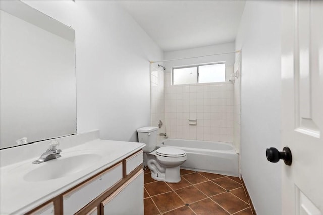 bathroom featuring vanity, toilet, tile patterned flooring, and shower / bath combination