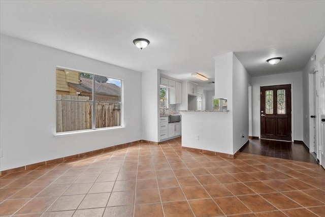 entrance foyer with baseboards