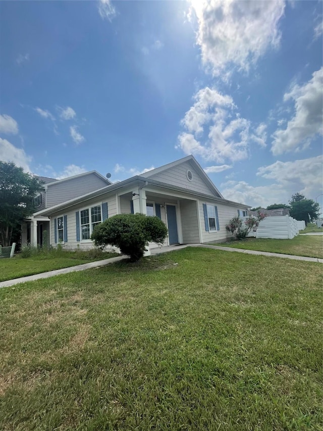 single story home with a front yard