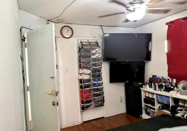 bedroom featuring ceiling fan and wood finished floors
