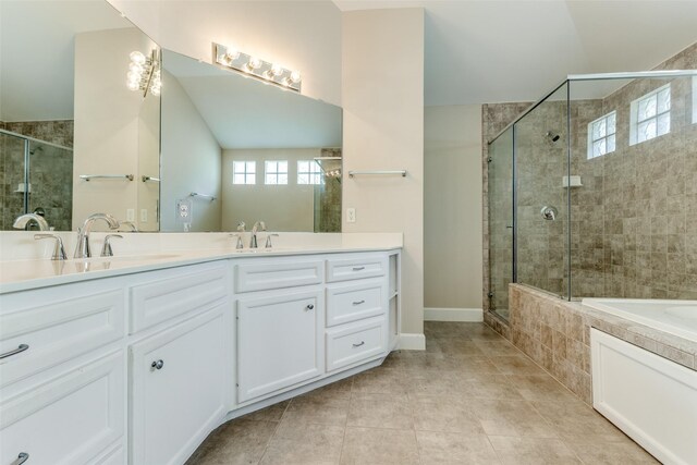 full bath featuring a stall shower, tile patterned floors, and a healthy amount of sunlight