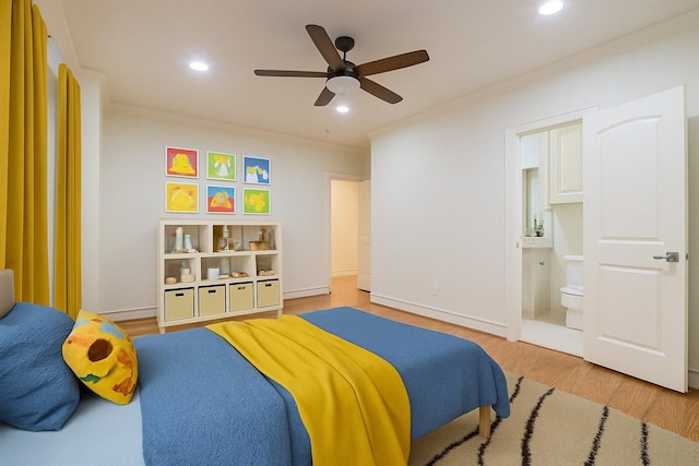 bedroom with recessed lighting, ornamental molding, light wood-style floors, and ensuite bathroom