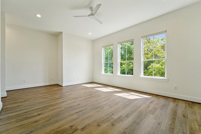 2520 Ohsfeldt St, Houston, TX 77008 - unfurnished room with baseboards, a ceiling fan, wood finished floors, and recessed lighting