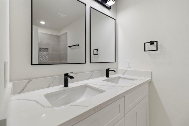bathroom featuring double vanity
