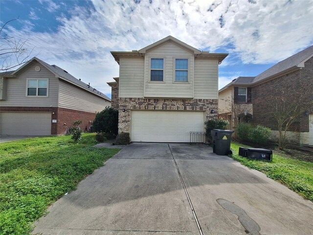 211 Sea Breeze Dr, Bacliff, TX 77518 - traditional home featuring concrete driveway and a garage