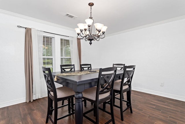 dining space with a chandelier, dark wood finished floors, visible vents, and ornamental molding