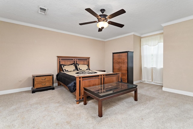 carpeted bedroom with baseboards, visible vents, a textured ceiling, and ornamental molding