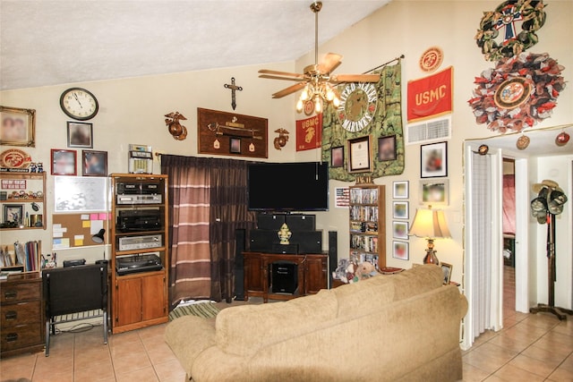 living room with lofted ceiling, a ceiling fan, tile patterned floors, and visible vents