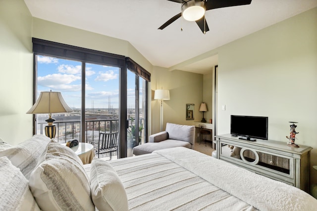 bedroom with access to exterior, ceiling fan, and vaulted ceiling