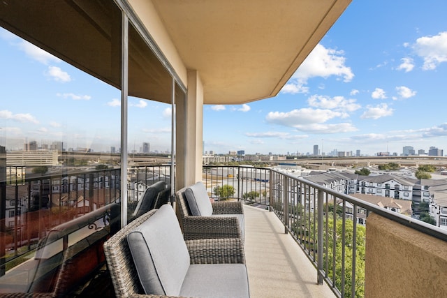 balcony featuring a view of city