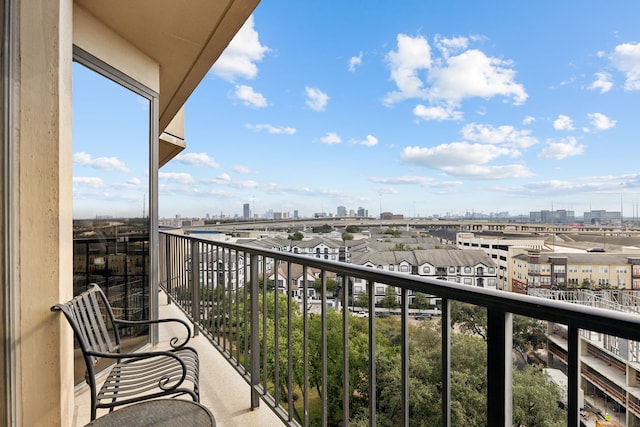balcony featuring a city view