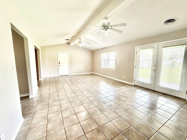 empty room with visible vents, vaulted ceiling with beams, light tile patterned flooring, baseboards, and ceiling fan