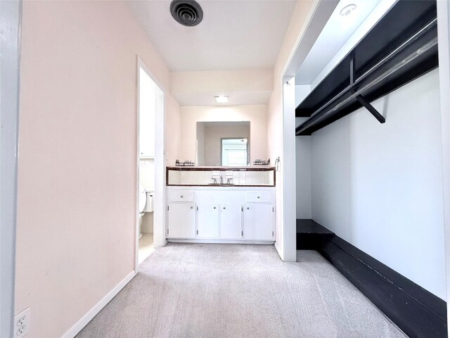 1206 Kent St, Sweeny, TX 77480 - interior space featuring visible vents, baseboards, vanity, and toilet