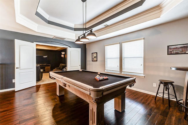rec room with billiards, arched walkways, a raised ceiling, ornamental molding, and dark wood-style floors