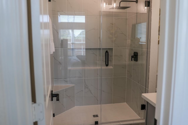 full bathroom featuring vanity and a stall shower