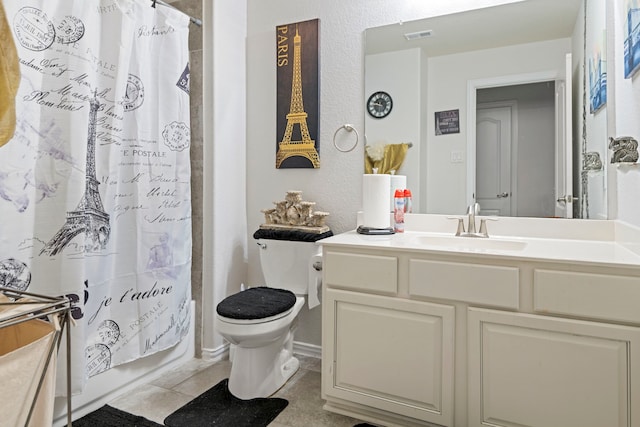 3203 Jeanette Cir, Mont Belvieu, TX 77523 - full bath with vanity, toilet, tile patterned flooring, and shower / bathtub combination with curtain