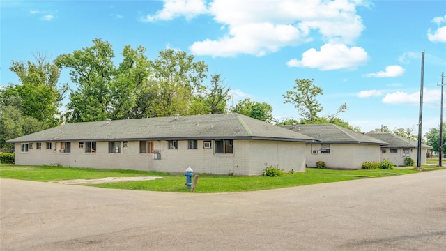 5409 Suez St Unit 4, Houston, TX 77020 - view of side of property with brick siding and a yard