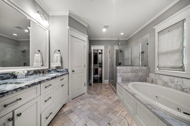 bathroom featuring a tub with jets, recessed lighting, ornamental molding, and a stall shower