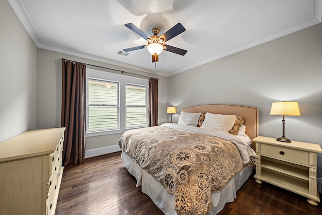 bedroom featuring crown molding, ceiling fan, baseboards, dark wood-style flooring, and visible vents