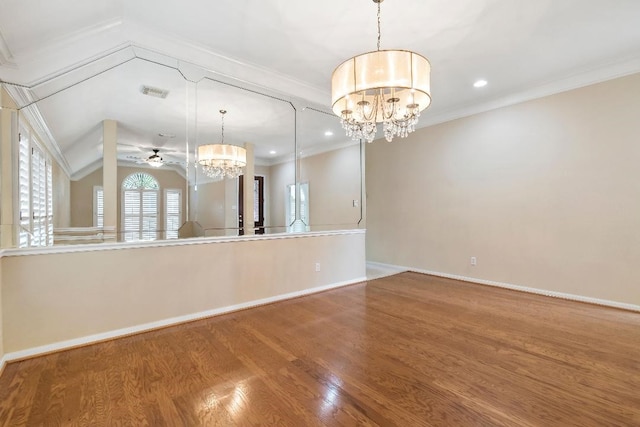 2538 Silent Shore Ct, Richmond, TX 77406 - spare room with a chandelier, wood finished floors, baseboards, ceiling fan, and ornamental molding