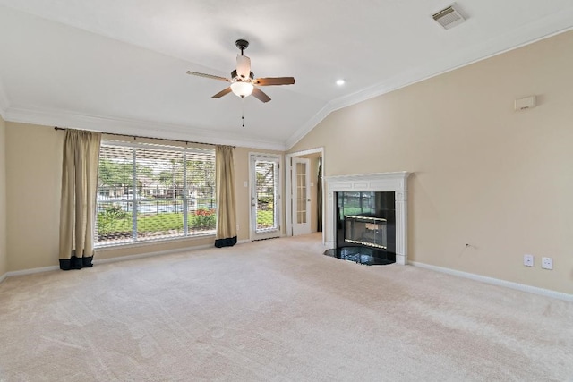2538 Silent Shore Ct, Richmond, TX 77406 - unfurnished living room with ornamental molding, baseboards, vaulted ceiling, carpet floors, and a fireplace