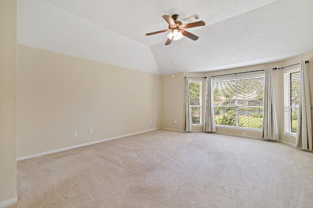 2538 Silent Shore Ct, Richmond, TX 77406 - spare room with healthy amount of natural light, carpet, baseboards, and vaulted ceiling