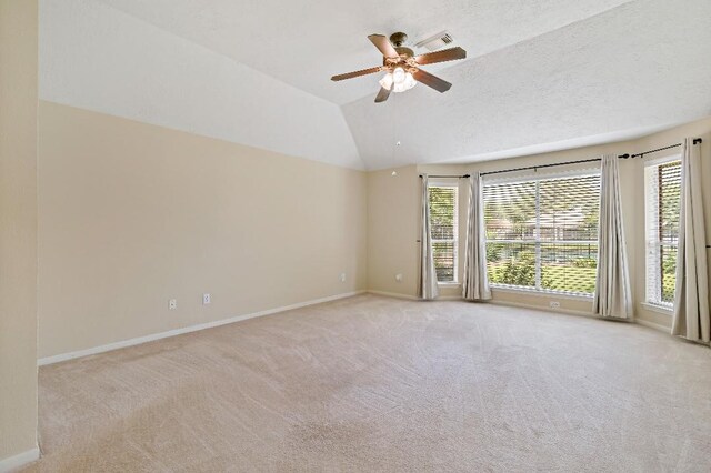 2538 Silent Shore Ct, Richmond, TX 77406 - spare room with healthy amount of natural light, carpet, baseboards, and vaulted ceiling