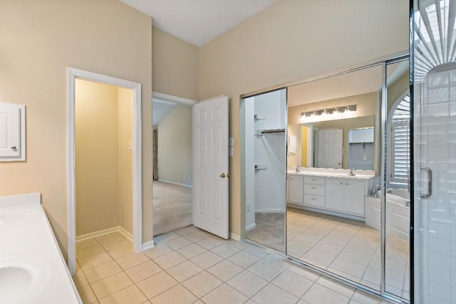 2538 Silent Shore Ct, Richmond, TX 77406 - full bath featuring tile patterned flooring, double vanity, and baseboards