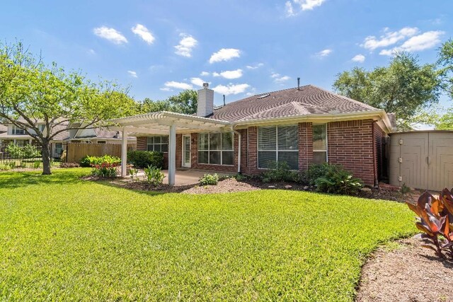 2538 Silent Shore Ct, Richmond, TX 77406 - back of property featuring a pergola, a patio, brick siding, and a chimney