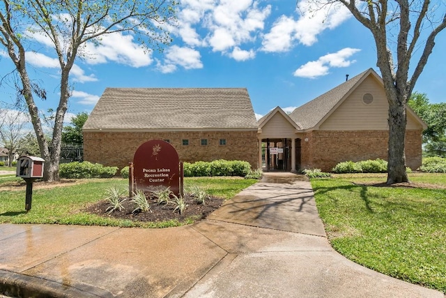 2538 Silent Shore Ct, Richmond, TX 77406 - view of front of house with a front yard and brick siding