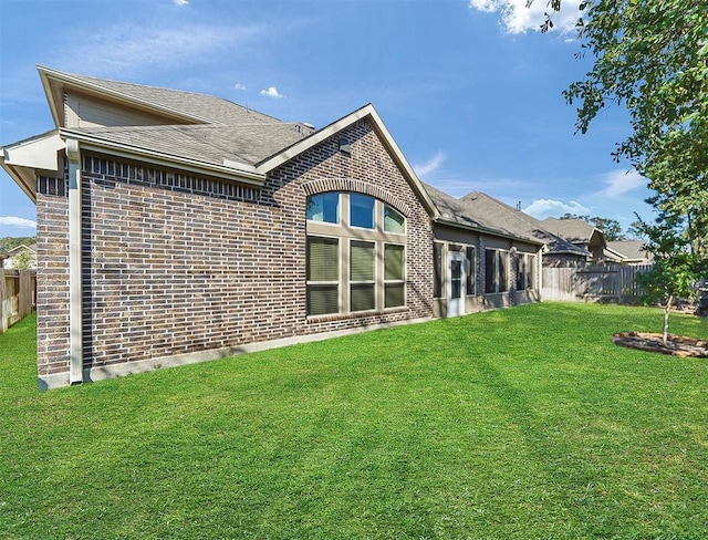 23423 Tavola Rosa Dr, New Caney, TX 77357 - back of house featuring brick siding